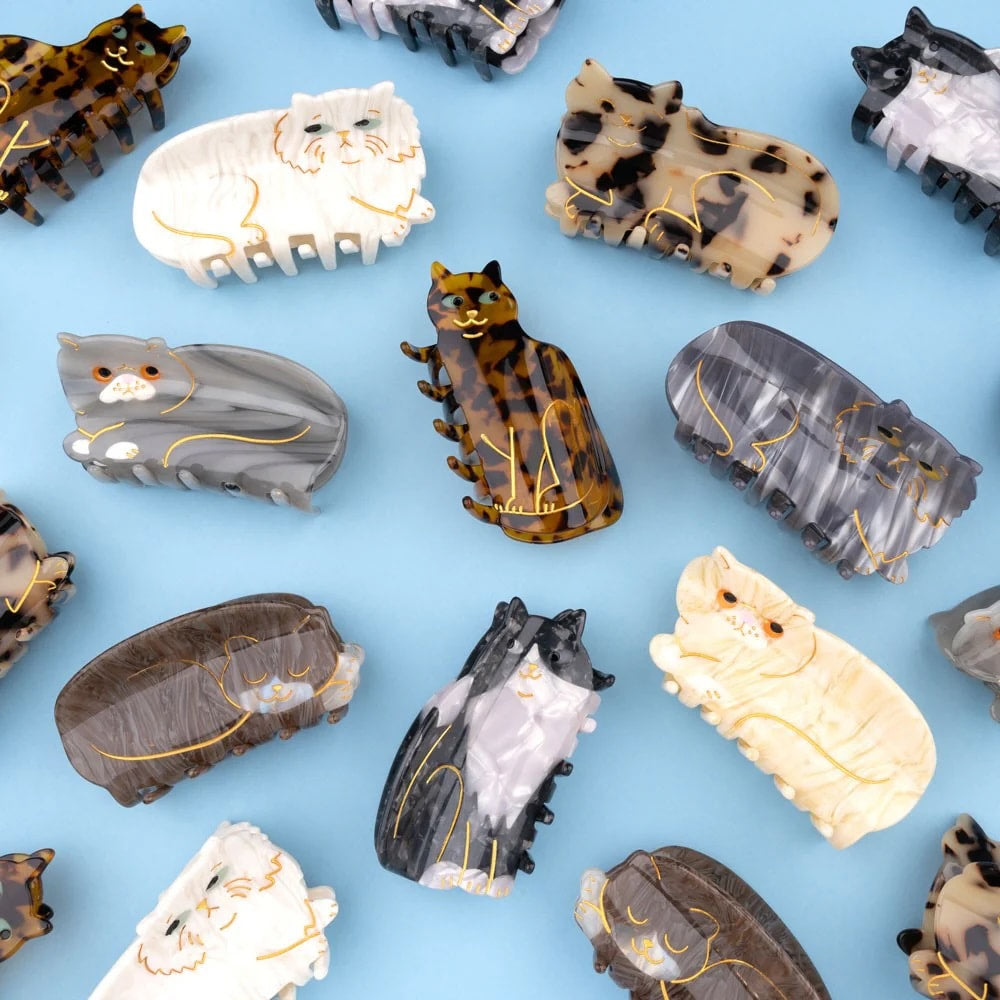 BLACK & WHITE CAT HAIR CLAW