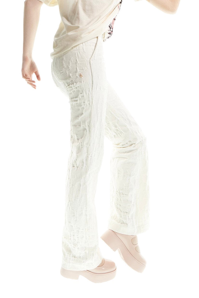 CAT scratched – flare jeans with ears – cream
